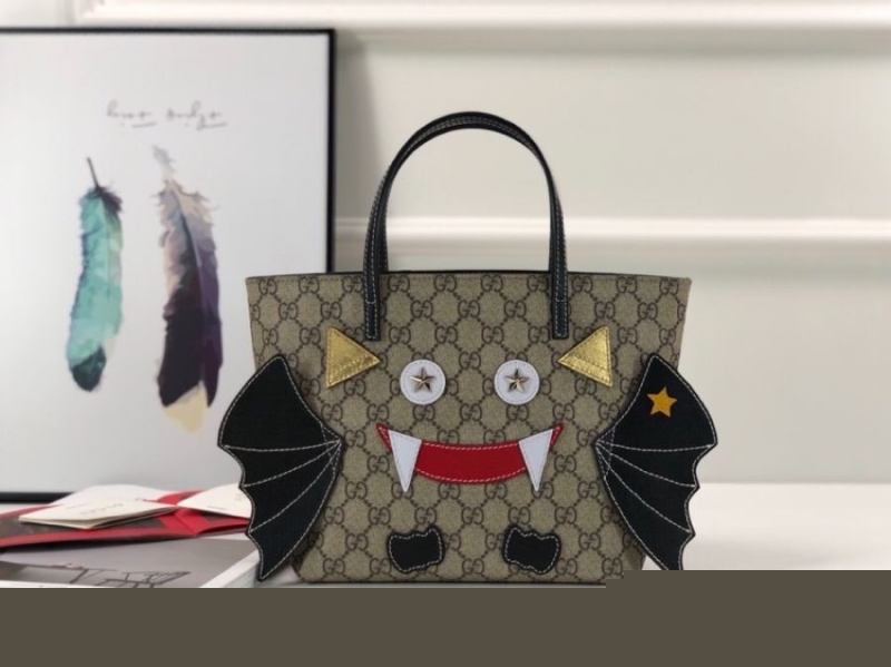 G*u*i shopping bags